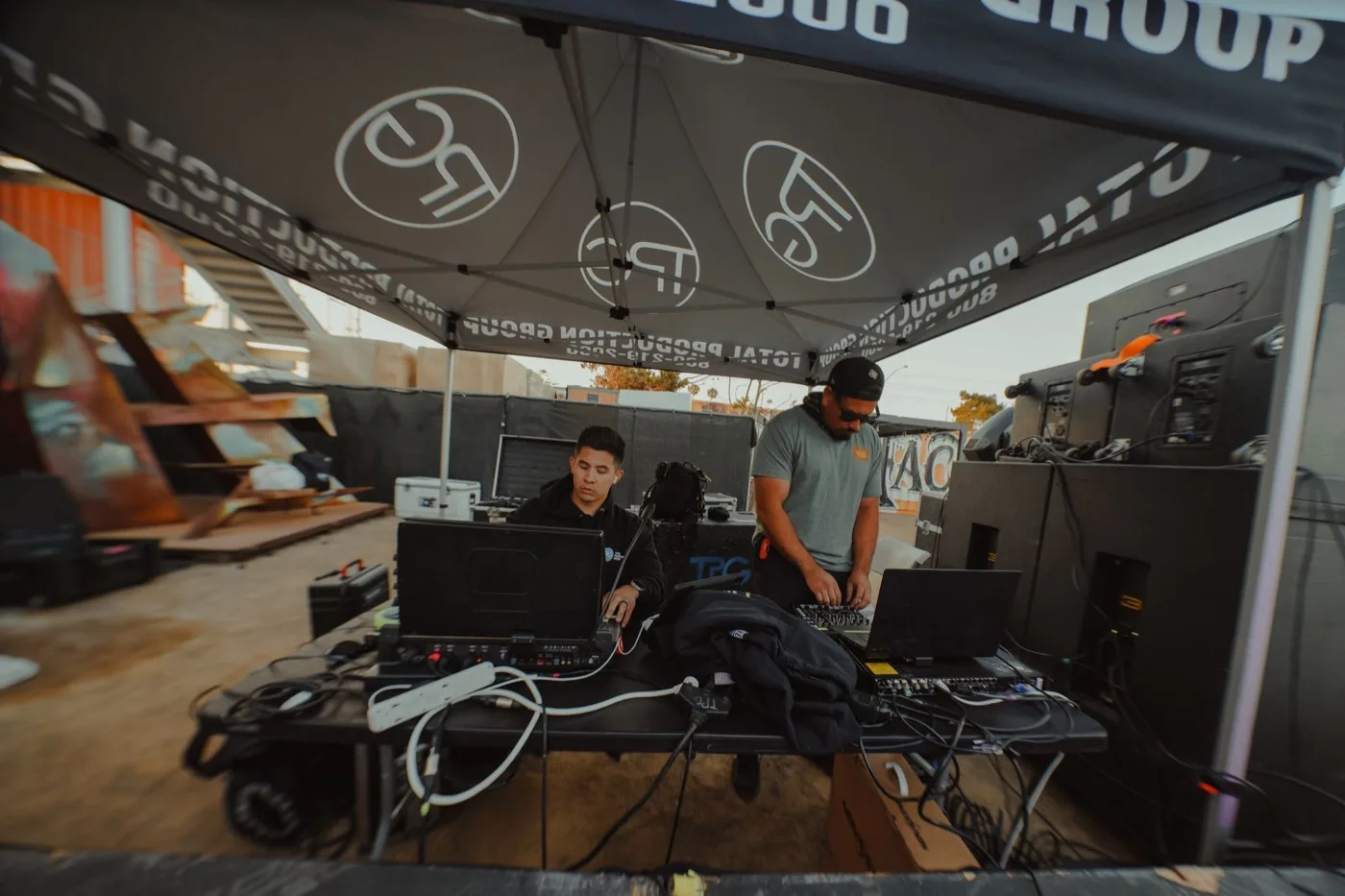 EPIC production tent with the lighting and audio gear laid out before doors